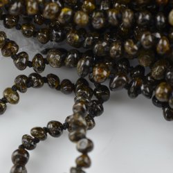 Baltic amber necklace with green color beads